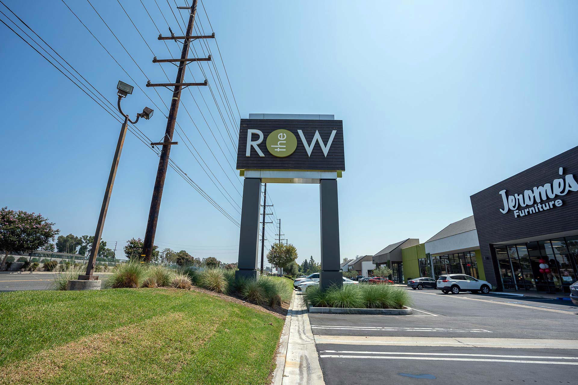 The Row logo large exterior road sign